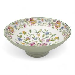 Minton Haddon Hall tea and dinner wares, including six cups and saucers, milk jug, six side plates (two different sizes), one sandwich plate, a large bowl and nine salad bowls 