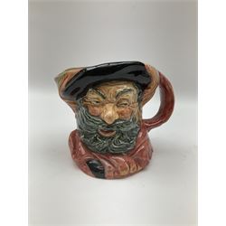 Royal Doulton toby jug of Winston Churchill H23cm and large character jug of Falstaff; together with four collector's plates by Royal Crown Derby, Royal Worcester and Limoges (6)