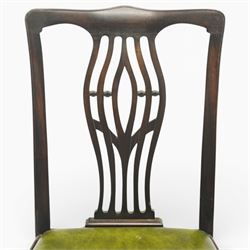 Set of eight Georgian style mahogany dining chairs, comprising six chairs and two carvers, the shaped top rails above pierced vase splats, and green leather upholstered drop in seats, upon square legs united by stretchers