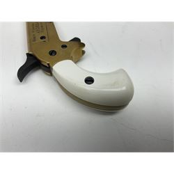 SECTION 1 FIRE-ARMS CERTIFICATE REQUIRED - Spanish Ardesa percussion vest pocket Derringer pistol, .31 cal. black powder; single shot; 6cm barrel; all brass body with white grips; no.14-13-013682-10 with Spanish certificate dated 2010 and box of one hundred balls