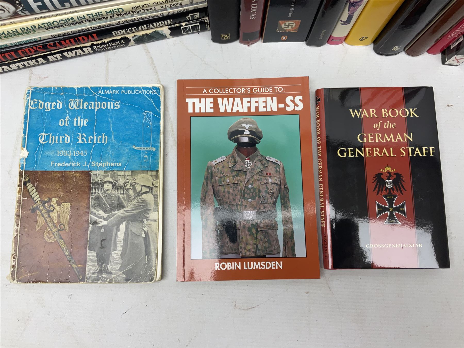Twenty-six books of WW2 German interest with particular emphasis on the 'SS', including Charles Sydnor: Soldiers of Destruction; G.S. Graber: History of the 'SS'; Bruce Quarrie: Hitler's Samurai; David Cesarini: Eichmann - His Life and Crimes; collector's reference books etc (26)