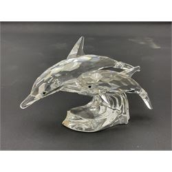 Nineteen Swarovski Crystal sea creatures, to include dolphins, seals, puffer fish, octopus, crabs, together with a quantity Swarovski Crystal shells 