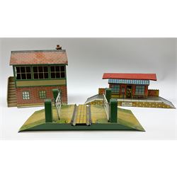 Hornby '0' gauge - layout accessories comprising PR1/PL1 Points, CR1 Right Angle Crossing and CA2 Acute Angle Crossing, all boxed; tin-plate signal box; tin-plate level crossing; textured wooden tunnel, possibly pre-WW2; and quantity of track, some boxed; together with '00' gauge tin-plate station