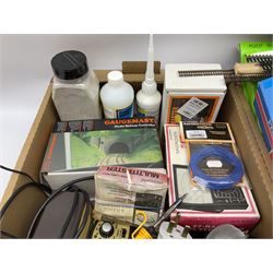 Model railway track and accessories, including various lengths of '00' and other gauge track, trees, artificial grass, various control units, unmade card construction kits for trackside buildings etc in three boxes (3)
