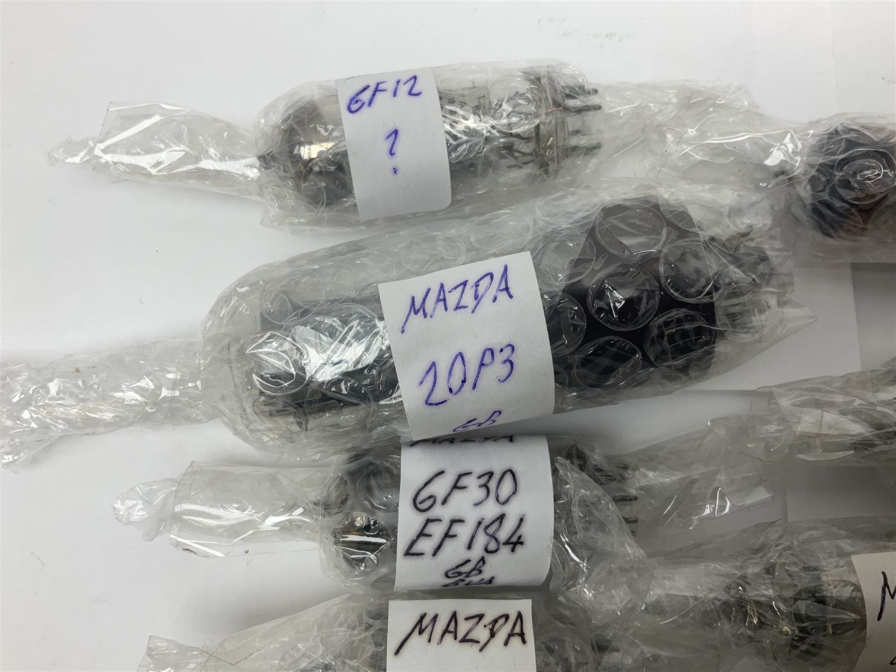 Collection of Mazda thermionic radio valves/vacuum tubes, including EH90, U26, PCF84, U26 approximately 55