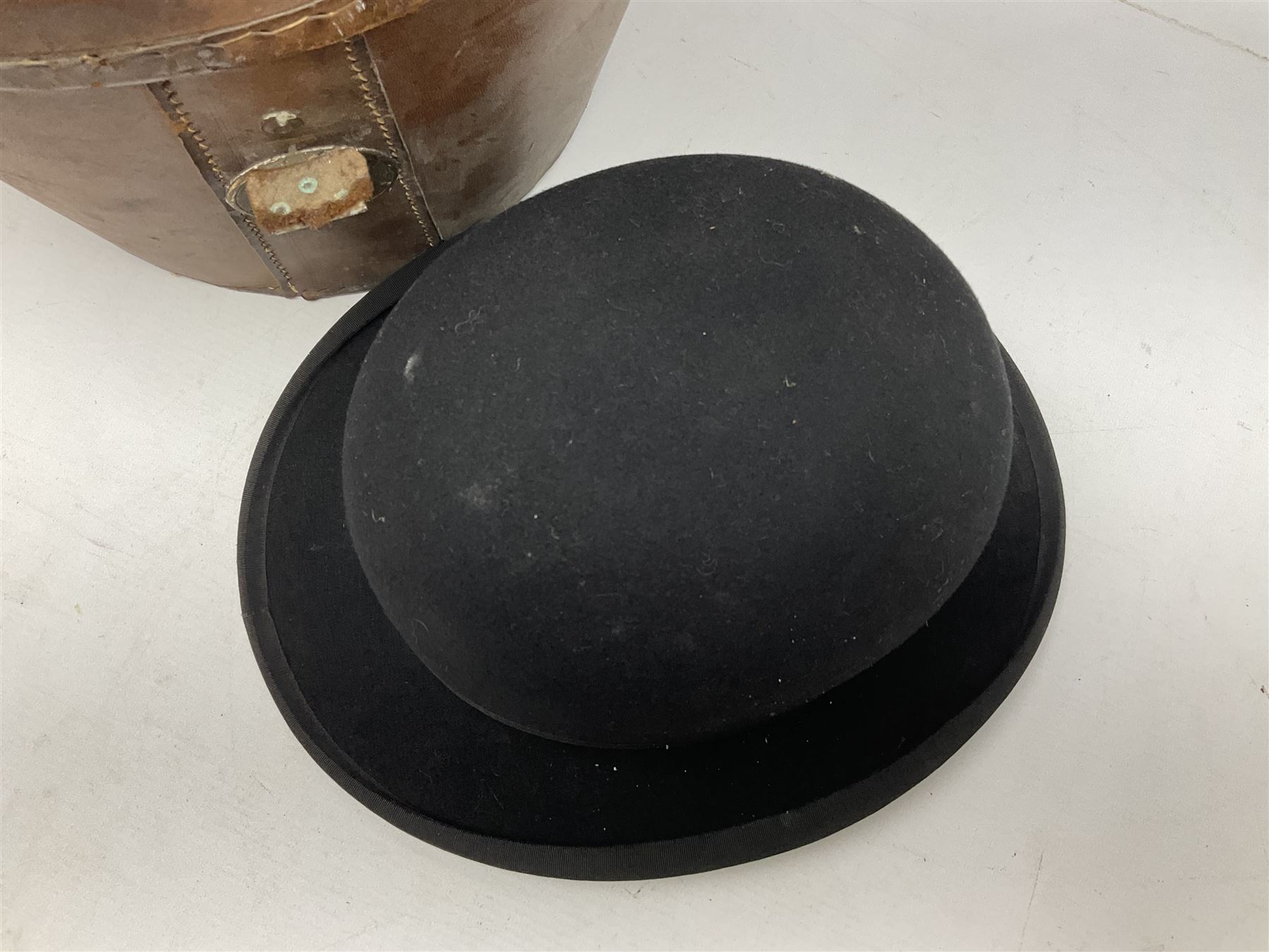 Bowler hat in leather hat box W36cm