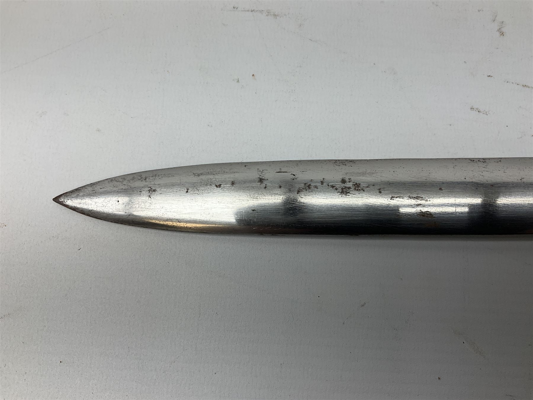 Reproduction Scottish basket hilted broadsword with 85cm double edged steel blade and red lined basket hilt with wire bound grip, in white metal mounted leather scabbard 107cm overall