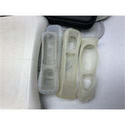 Nintendo Wii console, four controllers with cases and four nunchucks, Wii sensor bar, balance board and dance mat. Guitar hero wireless guitar for Wii and Redoctane wired guitar. Nintendo DS lite handheld gaming console, console and game cases and Guitar Hero Redoctane Guitar Grip. Selection of Nintendo Wii and Nintendo DS lite games to include Super Mario Galaxy, Guitar Hero, Wii Fit, Legend of Zelda games etc. Archos AV400 Series pocket video recorder with accessories, cradle and remote, in three boxes