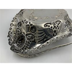 Edwardian silver swing handled basket, of navette form, with four repousse lion masks to each corner and with pierced and embossed floral, scroll and shell decoration to sides, base and handle, hallmarked Charles Horner, Birmingham 1906, height including handle H20cm