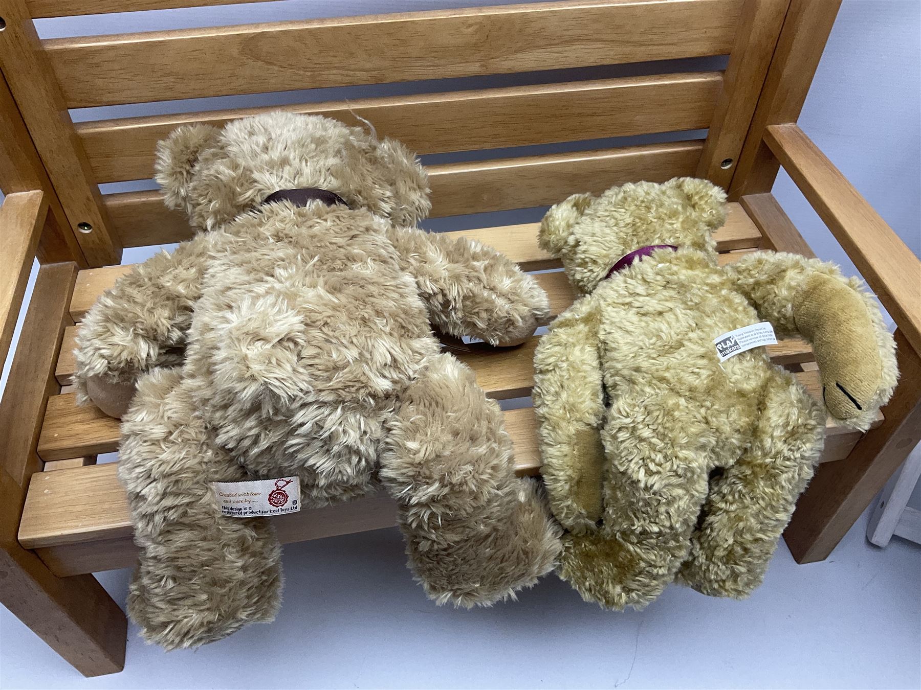 Charlie Bears bench, H41.5cm L58.5cm D29.5cm, and two Charlie Bears deck chairs, each approximately H37cm, together with a limited edition Silver Tag Bear, Logan Bear, 226/1,500, with tag, and two further bears, (6)