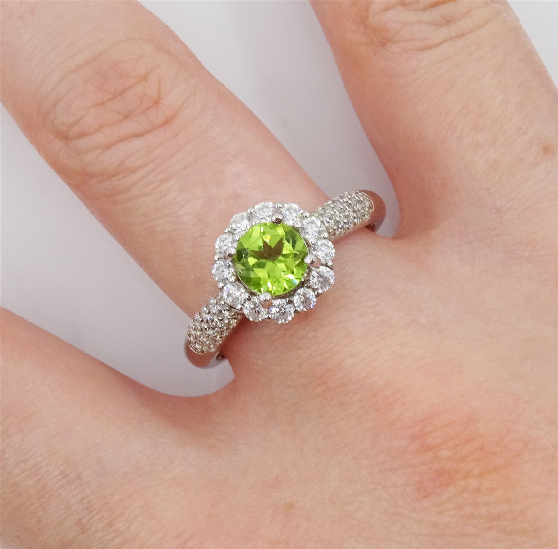 Silver peridot and cubic zirconia flower cluster ring, stamped 925