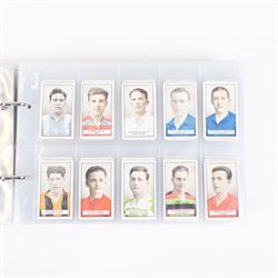 Collection of Edwardian and later Football related trading and cigarette cards, including forty-nine of fifty 1906 Ogden's Football Club Colours, 1922 PALS Footall series, ninety of one hundred 1925 Gallaher Famous Footballers, complete set of forty-four 1926 Ogden's Captains of Association Football Clubs and Colours, complete set of fifty 1927 Players Football Caricatures by MAC,  complete set of fifty 1927 Players Football Caricatures by RIP,  complete set of fifty 1930 Players Association Cup Winners, complete set of 50 1933 Ogdens AFC Nicknames etc, housed in brown cigarette card album
