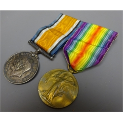 WWI medal pair comprising victory and war medal, named to 'Rev. W. Jacques', mounted on medal bar  