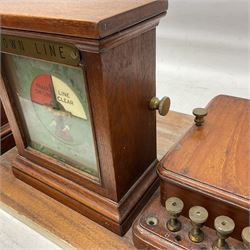 Railway signal boxes, mounted on plinth, with railway block indicators for Up Line and Down Line, having an electromagnetic indicator showing 'Train on Line' 'Line Clear' and 'Line Blocked', and brass signal bell to the centre, L100cm