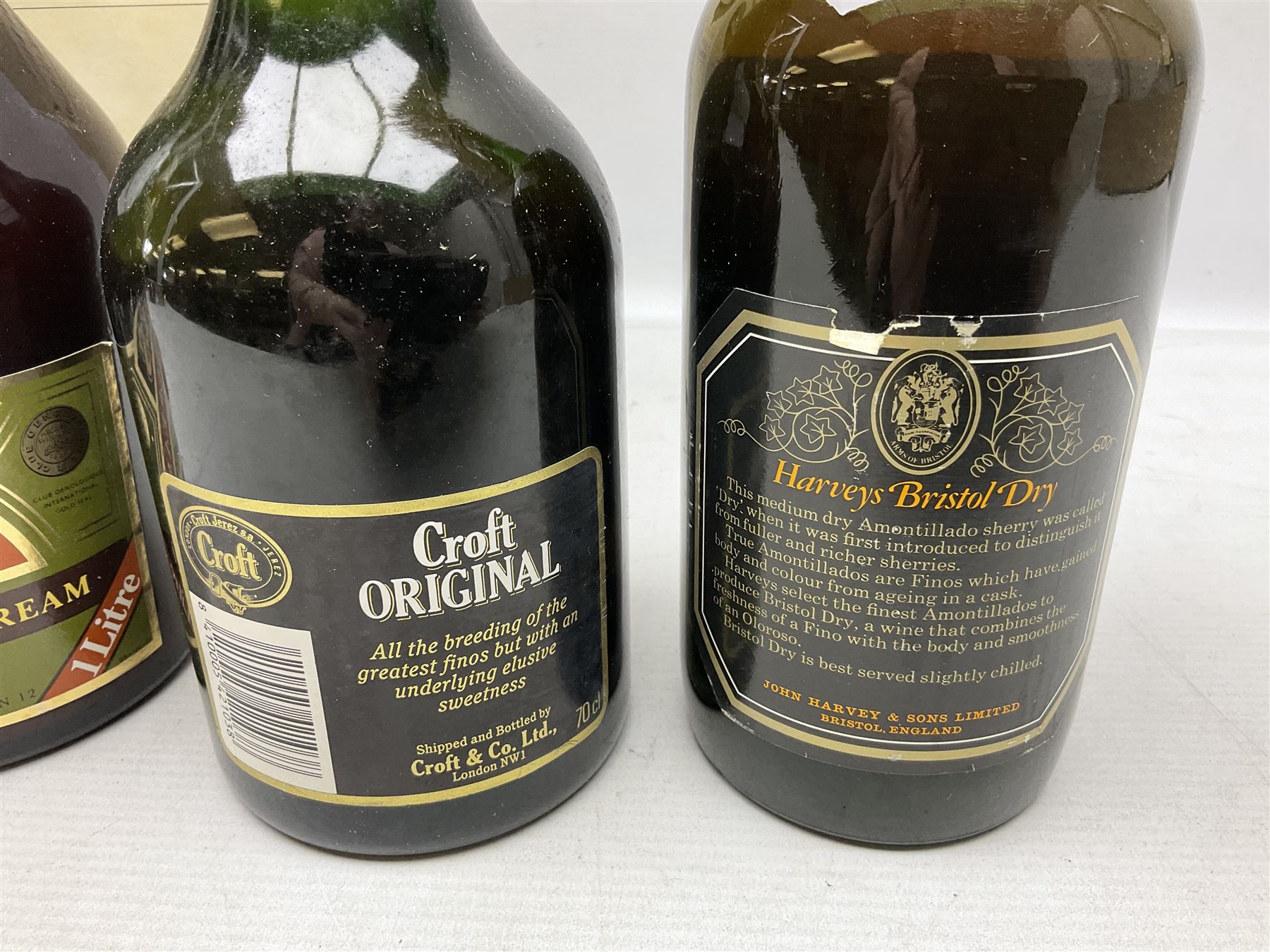 Mixed alcohol comprising Harveys Medium Dry Sherry, 70cl, one bottle, Croft Original Fine Old Pale Cream Sherry, 70cl, one bottle in box, Martini Extra Dry Vermouth, 90cl 18% vol, one bottle in box, Cockspur Barbados V.S.O.R Fine Rum, one bottle, and Baileys Irish Cream, 1l, one bottle (5)