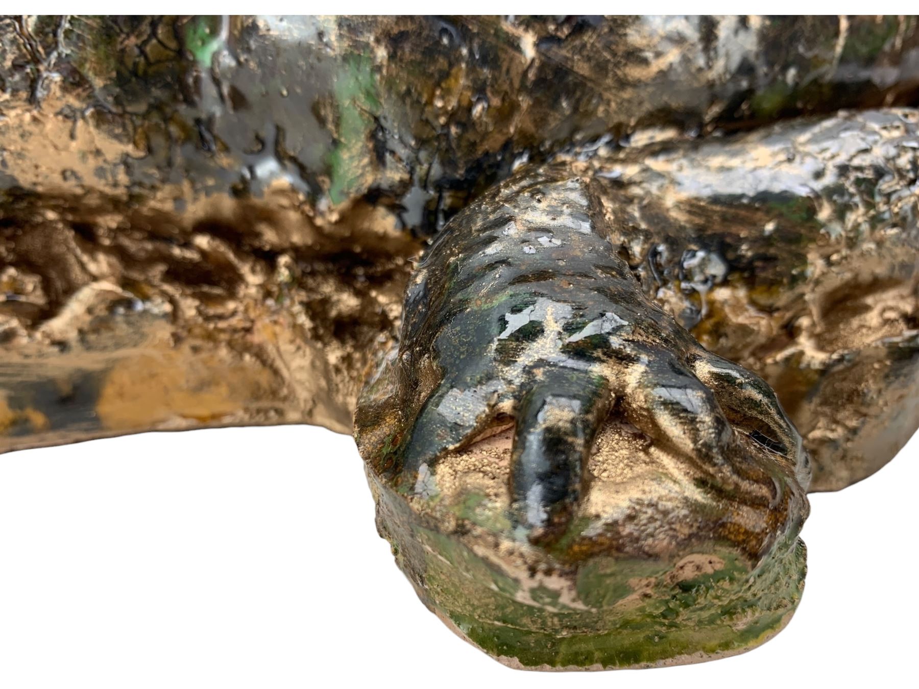 Galea Belinscaia (Yorkshire, Contemporary): Stoneware model of a baby alligator, with textured glaze finish, L56cm 