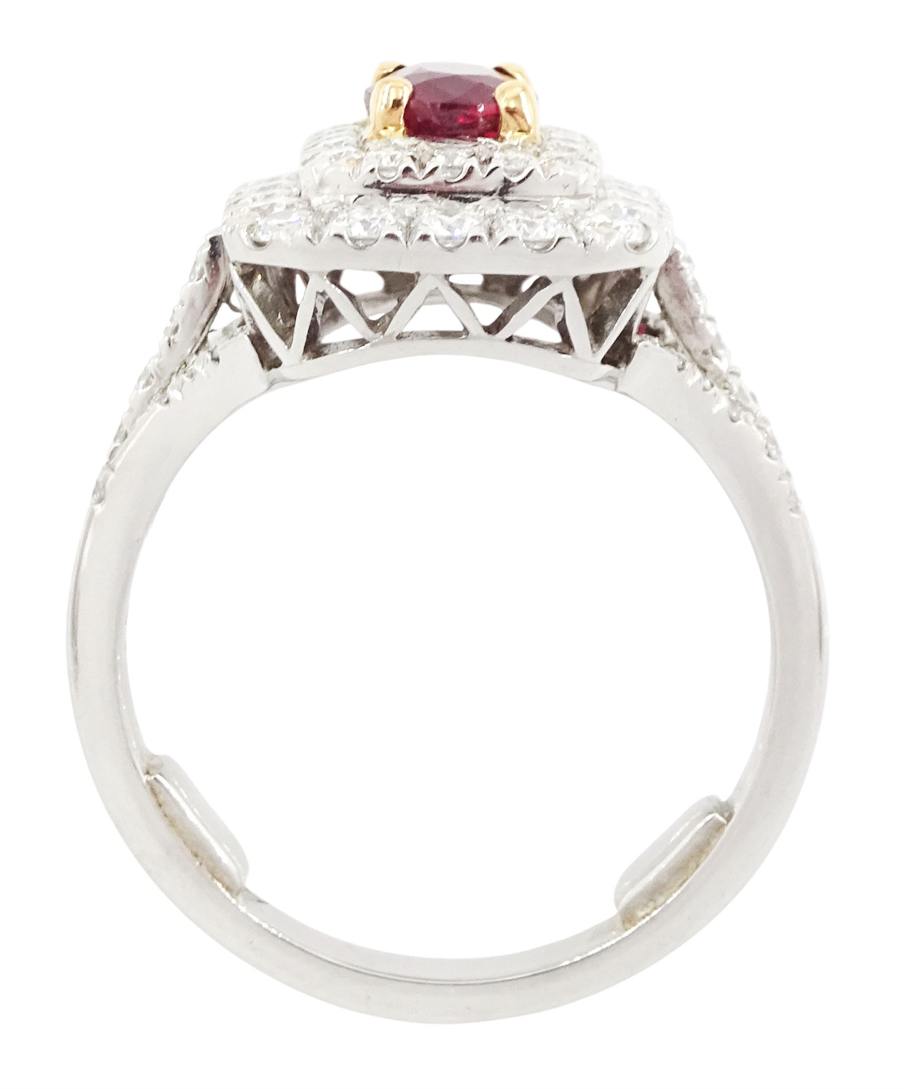 Platinum ruby diamond cluster ring, single oval cut ruby  in a four claw 18ct rose gold setting of approx 1.02 carat, surrounded by two rows of round brilliant cut diamonds and split diamond set shoulders, London 2017, total diamond weight approx 0.76 carat, with Alan Poultney Gems report