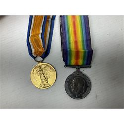 Pair of WWI medals, comprising British War medal and Victory medal, both with ribbons