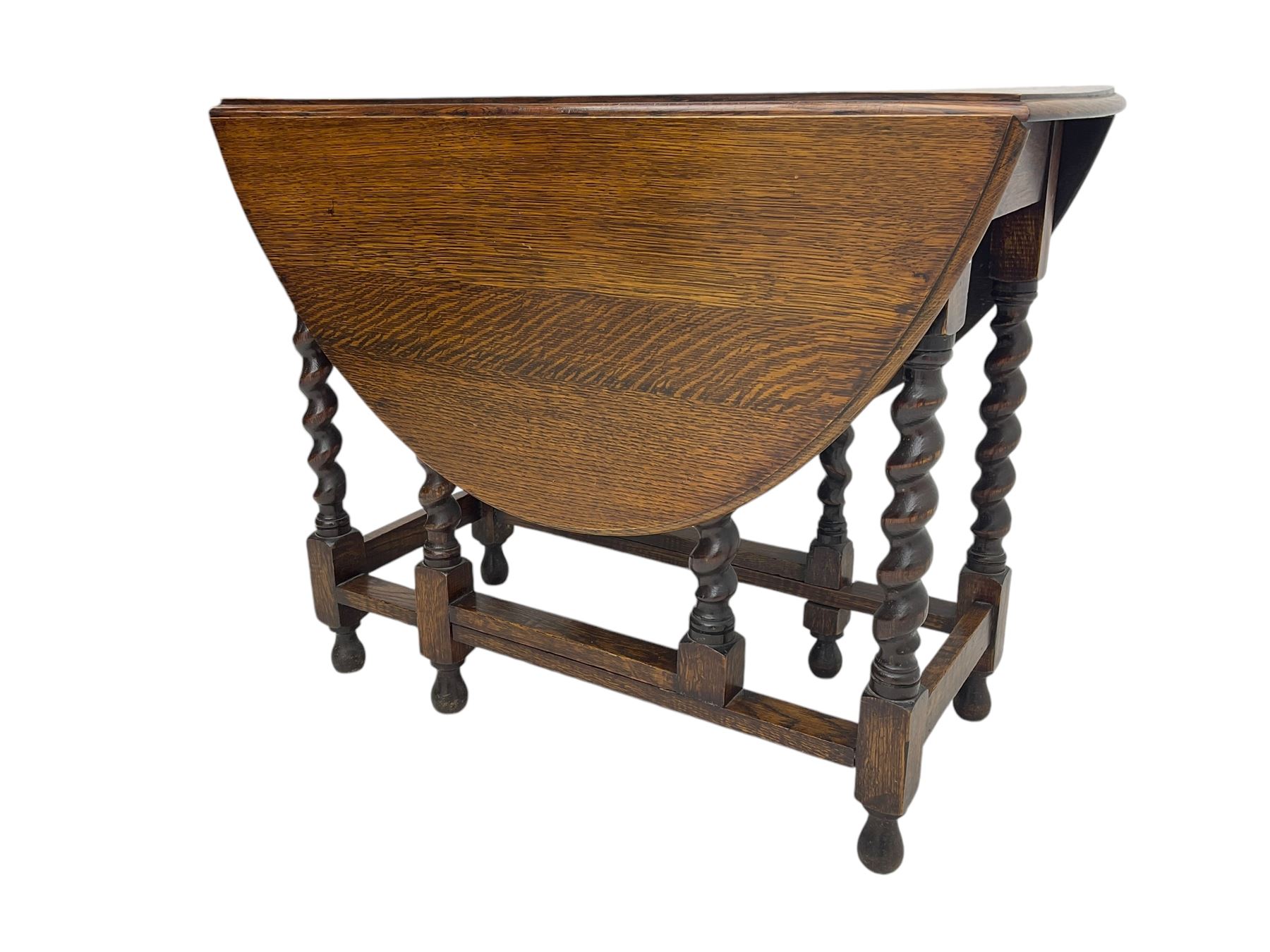 20th century oak drop-leaf dining table on spiral turned supports 