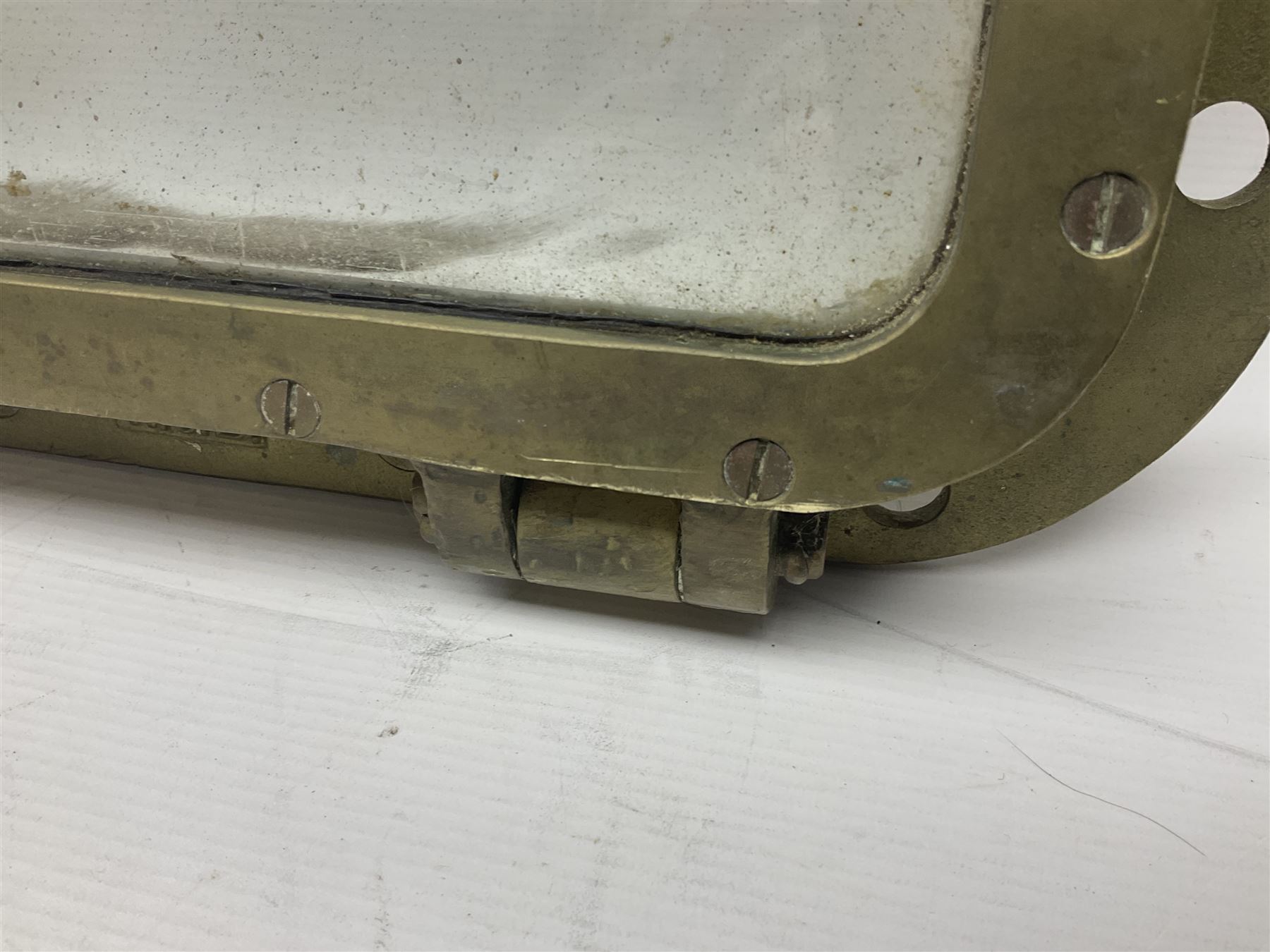 Rectangular brass porthole with hinged window, H46cm, L66cm