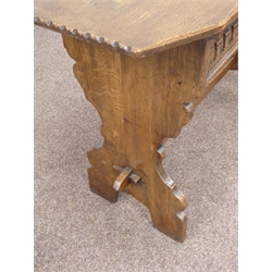  17th century style oak side table, canted rectangular top with incised decoration, two drawers with arcade carved fronts, splayed shaped end supports jointed by pegged stretcher, W107cm, H76cm, D51cm  
