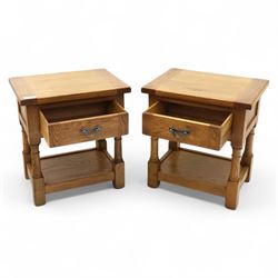 Old Charm - ‘Chatsworth’ pair of light oak lamp tables, each with moulded rectangular top, single drawer and metal drop handle, raised on turned supports joined by undertier shelves