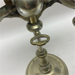 Miller & Sons Piccadilly polished brass double adjustable student's oil lamp, with green glass shades, H52cm