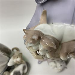 Five Lladro figures, including The Lamp Lighter no 5205,  Girl and Kittens no 6102, Cat no 5113 etc