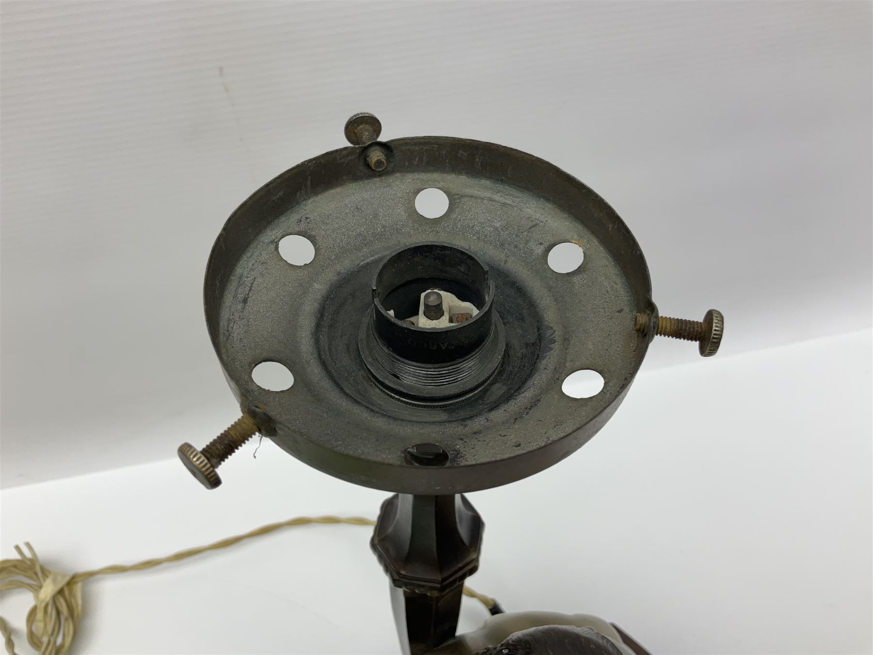 Art Deco style bronzed and gilded spelter figural table lamp with green Uranium glass shade; H48cm, another table lamp; and a bisque group