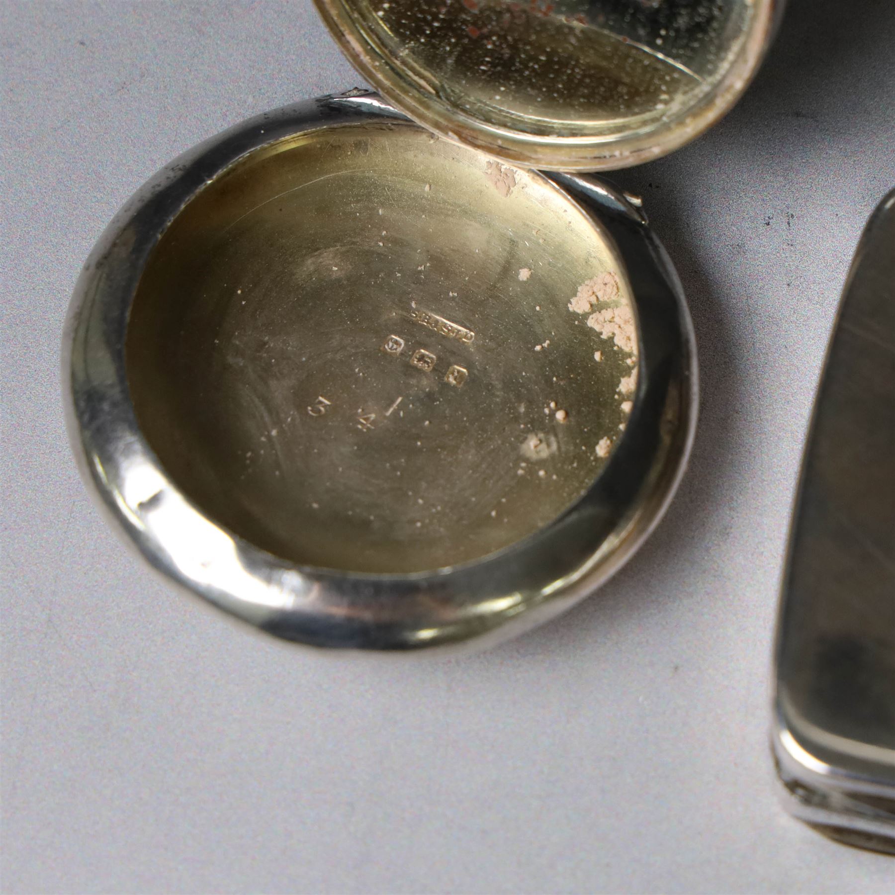 Edwardian silver compact, of circular form with mirror to interior, engraved with name to cover and underside, hallmarked S Blanckensee & Son Ltd, Birmingham 1910, together with a plain continental silver snuff box, stamped 800, box W8cm