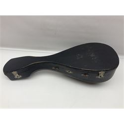 Late 19th century Italian lute back mandolin with segmented bowl back, bears label Gennaro Maglioni Napoli L61cm; in ebonised wooden case; together with another similar damaged Italian lute back mandolin for restoration or spares (2)