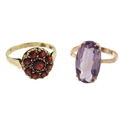 Early 20th century rose gold single stone amethyst ring and a later garnet cluster ring, both 9ct