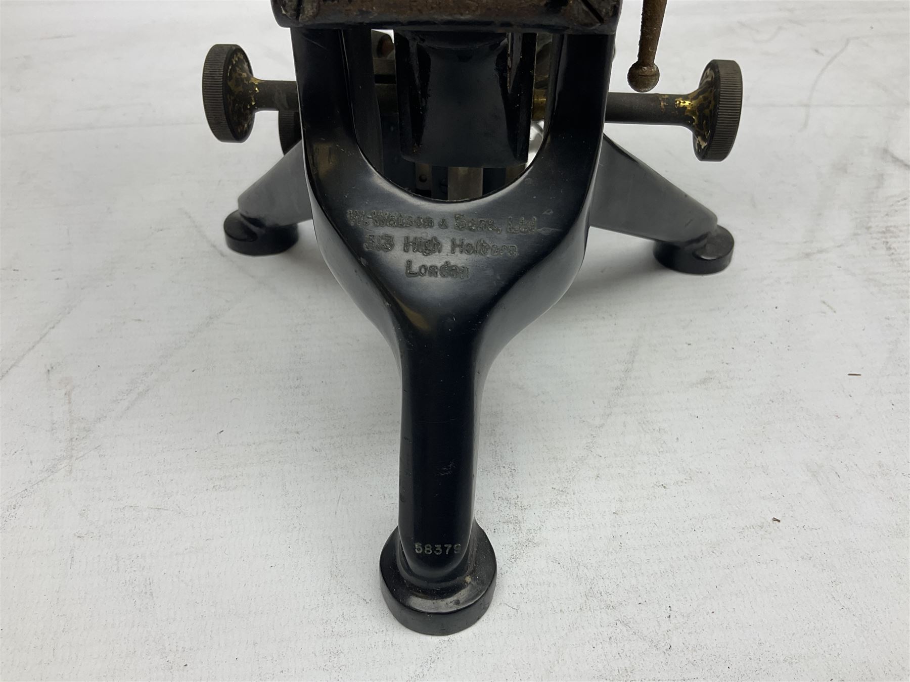 19th century brass and black japanned monocular microscope by W. Watson & Sons Ltd. 313 High Holborn, London serial no.24788 with rack and pinion focussing on tripod base H31cm; in fitted mahogany case retailed by A.H. Baird Scientific Instrument Makers Edinburgh; quantity of additional lenses and accessories; together with another similar uncased monocular microscope by W. Watson serial no.58379 (2)