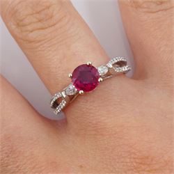 18ct white gold round ruby ring, with two marquise shaped diamonds either side and diamond set shoulders, hallmarked, ruby approx 0.85 carat