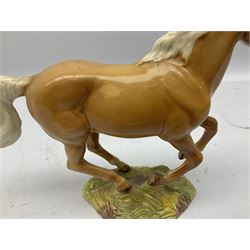 Beswick figure of cantering Palomino horse on base model no 1374, with impressed and printed mark beneath, H18cm