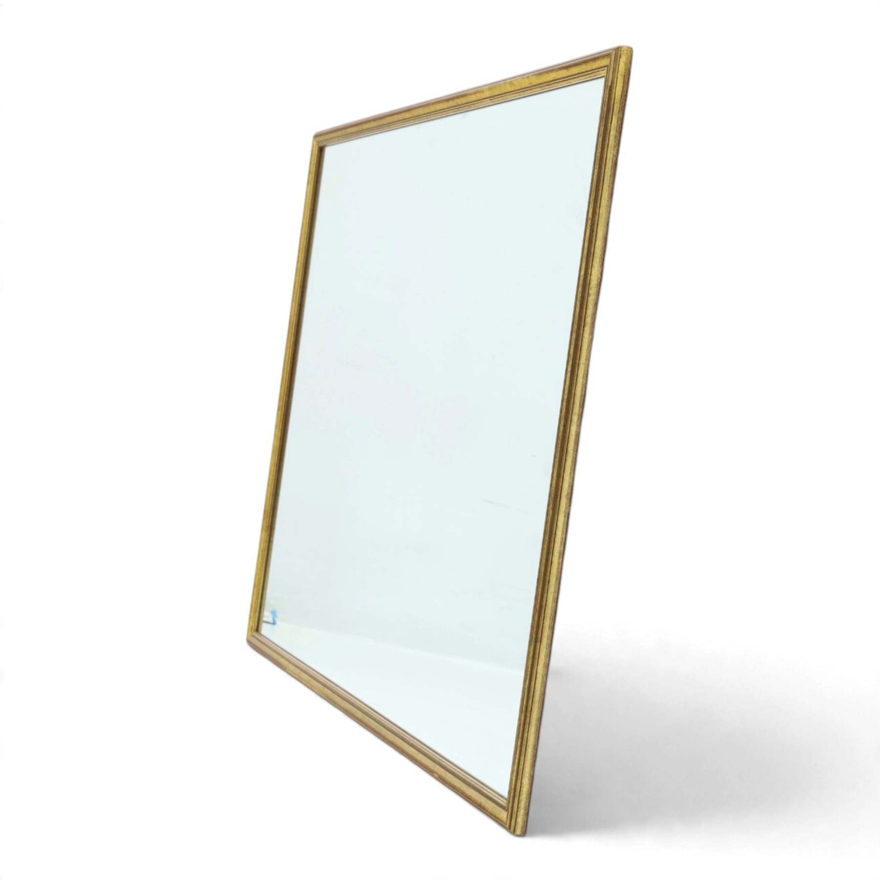 Contemporary giltwood wall mirror, of rectangular form with moulded frame