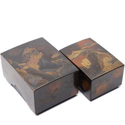 Nest of Japanese Meiji period lacquered boxes, the nashiji ground with maki-e decoration, each cover depicting a traditional landscape, the sides painted with traditional Japanese foliage, larger box H7cm (2)