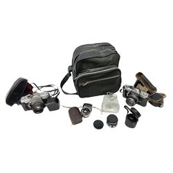 Petri FT 35mm SLR camera with a Petri 1:1.8 55mm lens, Petri Flex camera with a Petri 1:2 55mm Kuribayashi lens, together with cases and quantity of lenses etc