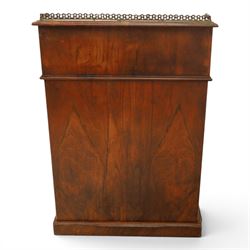 Victorian figured walnut Davenport, the fixed fall with drawer to the side enclosing writing compartment, green tooled leather writing inset, galleried back rail, right side fitted with four drawers behind a panel, opposing panelled side, raised on carved cabriole front supports with scroll terminals and platform base