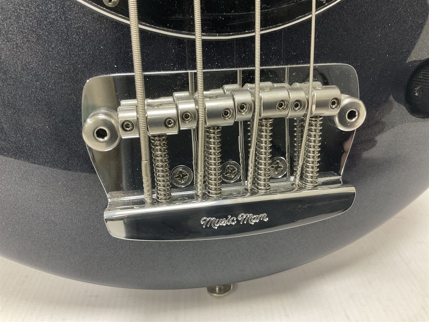 Music Man Bongo 4 string bass guitar, in sapphire black finish, serial no F42547, in black Music Man hard case, guitar L113cm