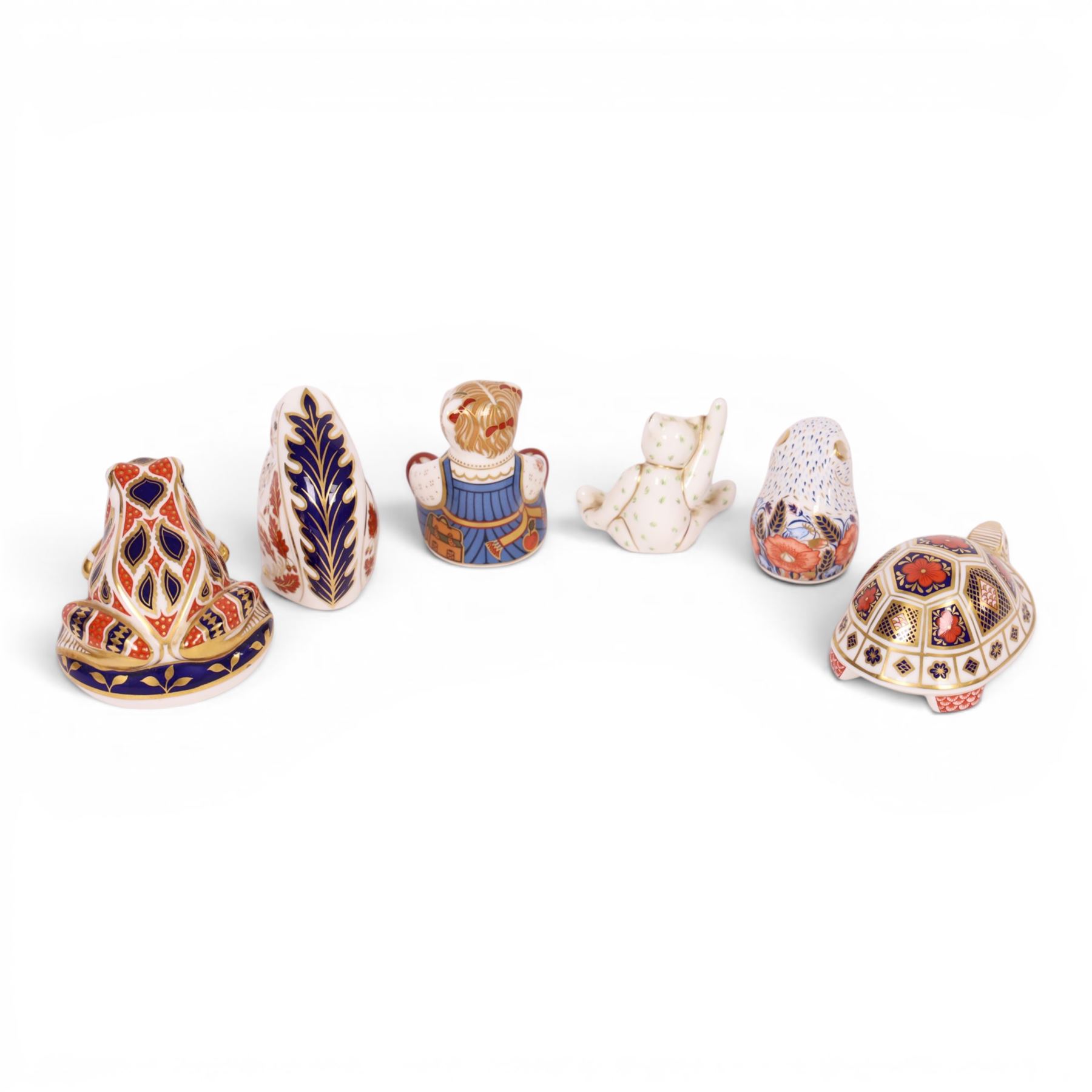 Six Royal Crown Derby paperweights, including Schoolgirl Teddy gold stopper, Poppy Mouse gold stopper, Squirrel gold stopper, etc  