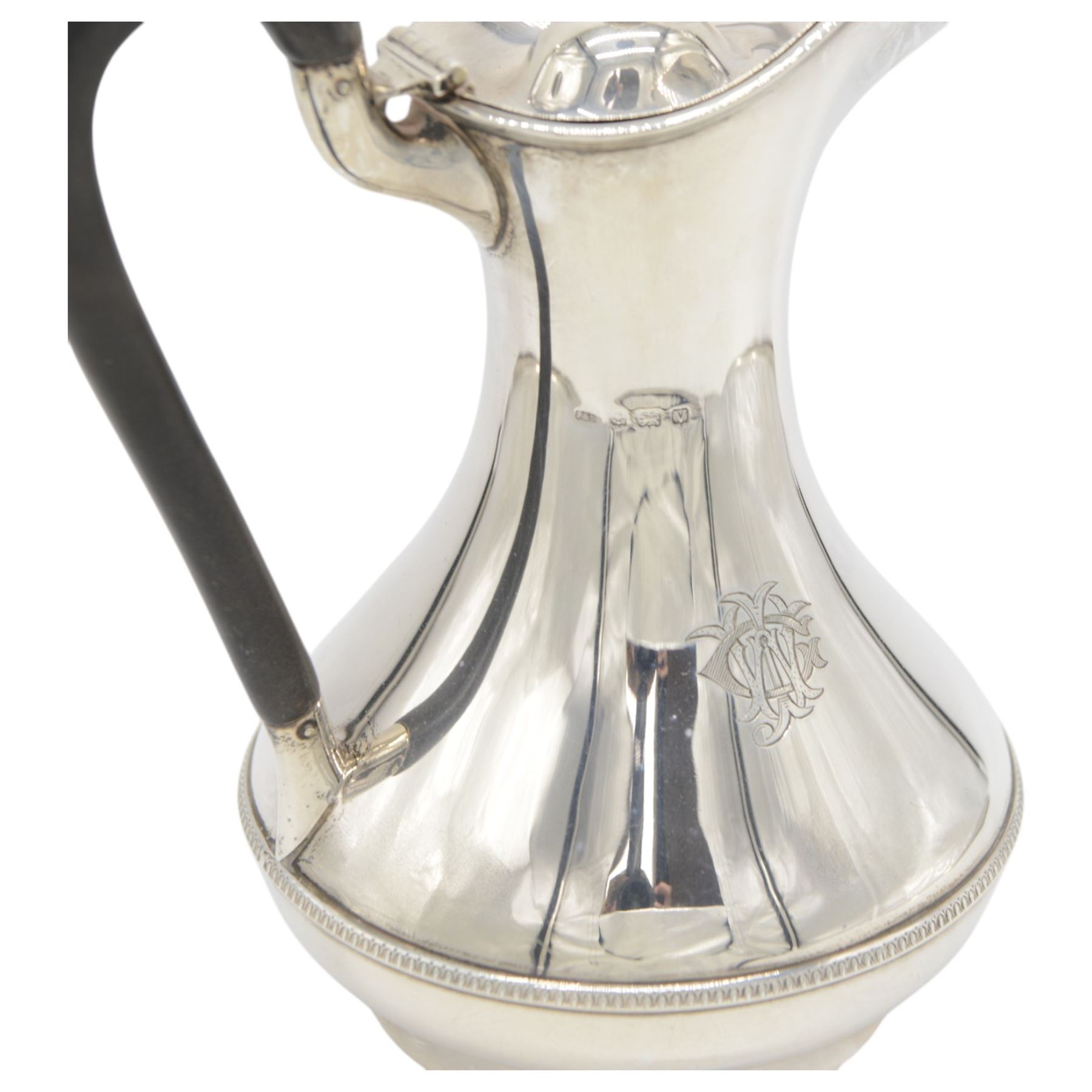 1930s silver hot water pot, of bellied form engraved with monogram to body, with Bakelite type handle and urn finial, hallmarked Fattorini & Sons Ltd, Birmingham 1938, H23cm