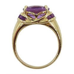 9ct gold oval amethyst ring, with round amethyst set shoulders, hallmarked