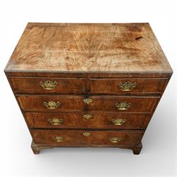 Georgian mahogany chest of drawers, the rectangular top above two short drawers over three long graduated drawers, each with brass swan neck handles and escutcheons, raised on shaped bracket feet