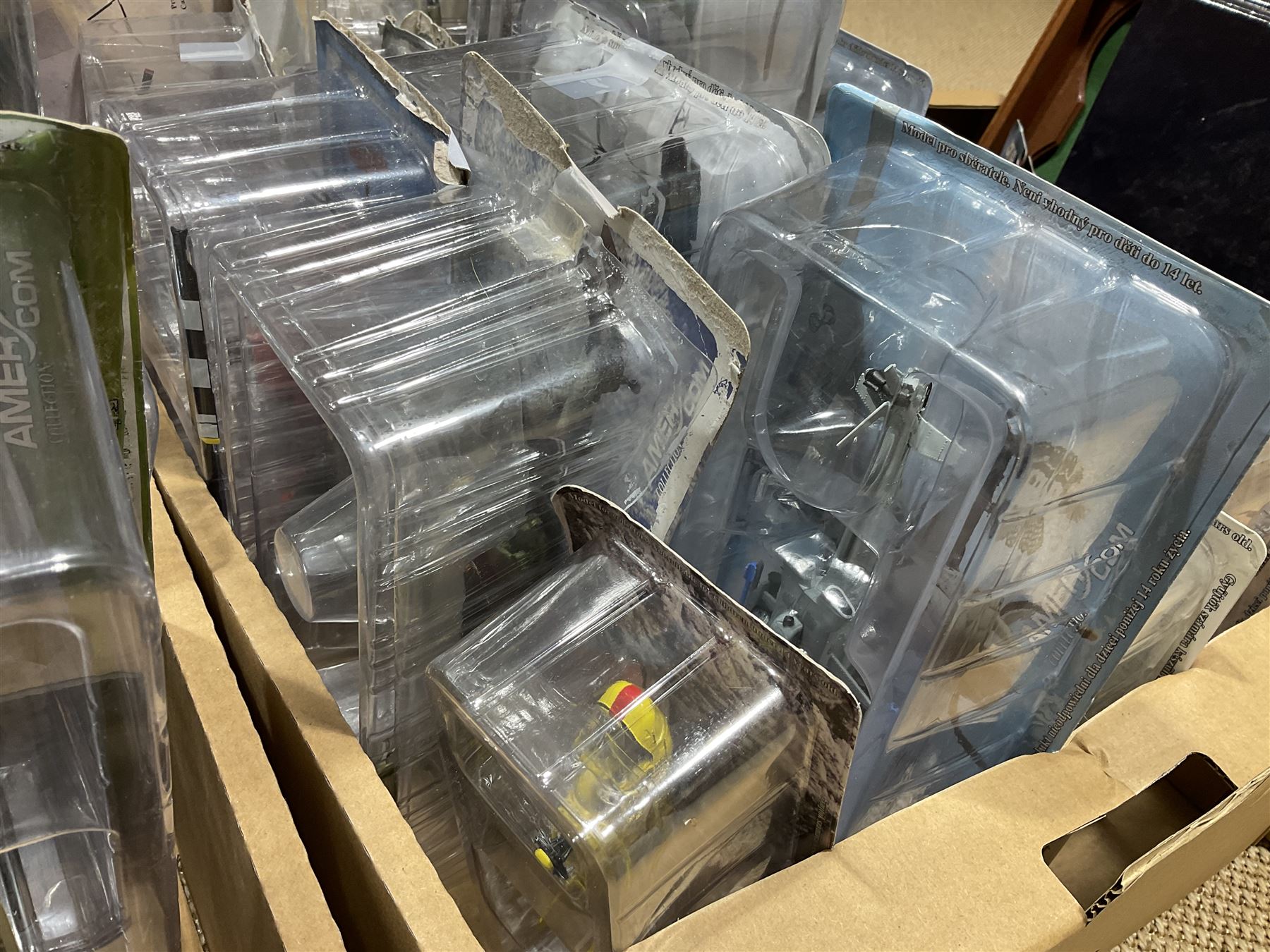 Thirty-six Amer Czechoslovakia periodical issued metal models of helicopters in original packaging; with thirty-nine issues of 'Helicopter Magazine' in two original binders; together with eight Corgi Collection die-cast military models; all boxed; and two others with small display rack; in three boxes