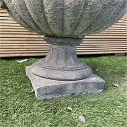 Pair of squat cast stone garden urns, with handles on pedestal  base, D50, H45 - THIS LOT IS TO BE COLLECTED BY APPOINTMENT FROM DUGGLEBY STORAGE, GREAT HILL, EASTFIELD, SCARBOROUGH, YO11 3TX