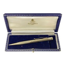 9ct gold Yard O Led propelling pencil, patent No. 422767, engine turned decoration and  engraved with initials H.W.W.F, Birmingham 1973, in Mappin & Webb case