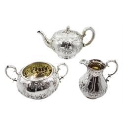 Victorian silver three piece tea service, embossed floral and swag decoration by Henry Wilkinson & Co, London 1862, approx 41.5oz