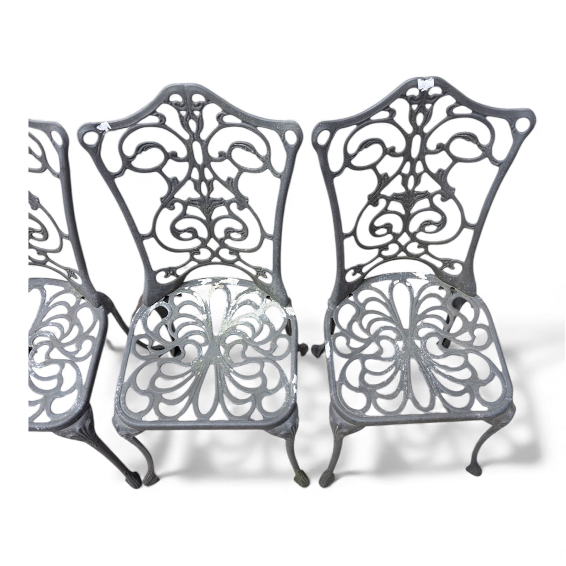 Cast aluminium garden table and four chairs in dark grey