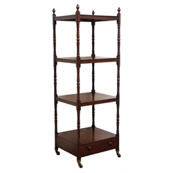  Early 19th century mahogany what-not, four tiers on turned supports with finials, base drawer with turned wooden handle, brass sockets and castors, H143cm, W48cm, D43cm  